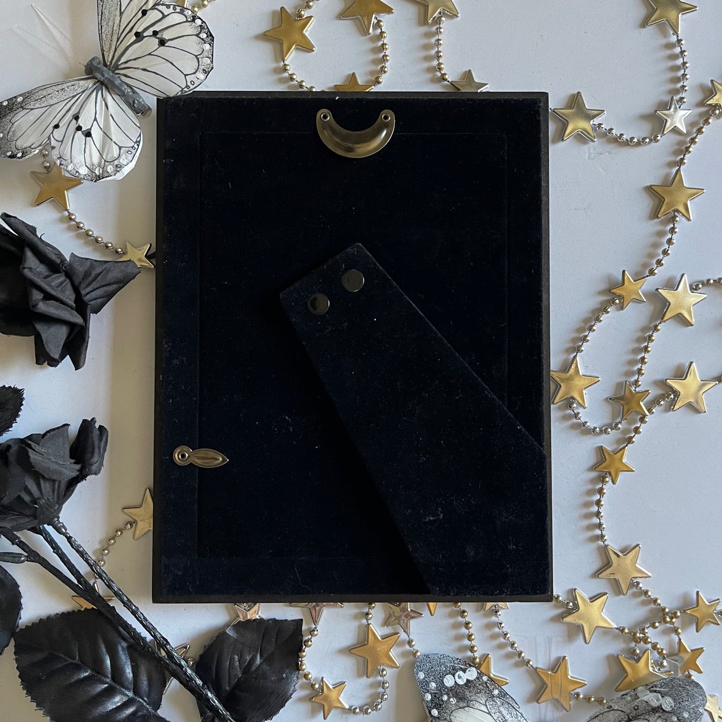 Black and Silver Ornate Frame of Tombstone